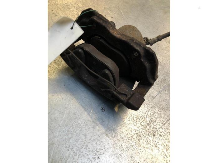Front brake calliper, right from a Ford Focus 3 Wagon 1.6 TDCi 16V ECOnetic 2012