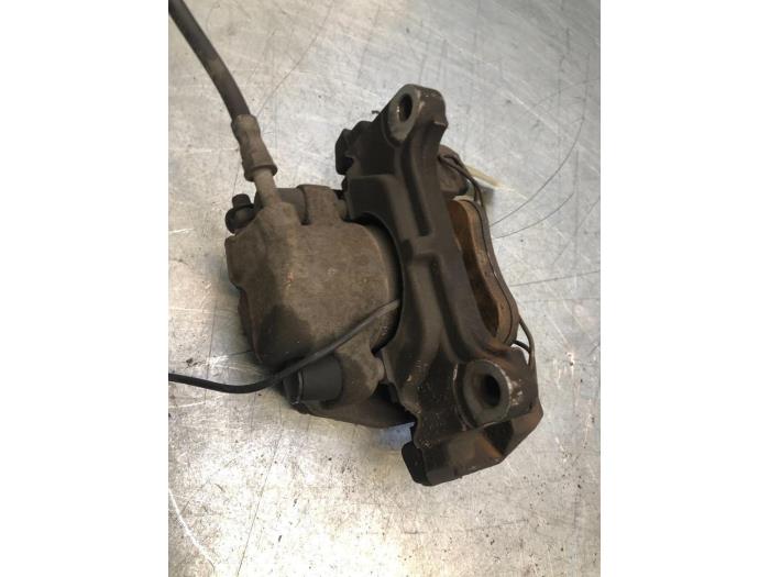 Front brake calliper, left from a Audi A4 (B8) 1.8 TFSI 16V 2010