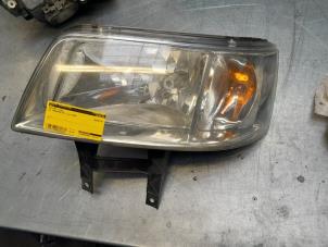 Used Headlight, left Volkswagen Transporter T5 2.5 TDi Price € 50,00 Margin scheme offered by Poolman autodemontage