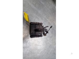 Used Rear brake calliper, left Mini Countryman (R60) 1.6 16V Cooper S Price € 30,00 Margin scheme offered by Poolman autodemontage
