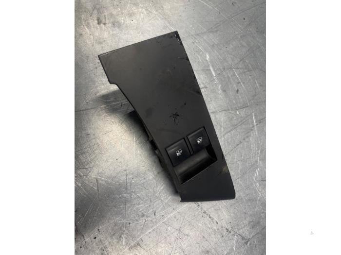Electric window switch from a Opel Astra J (PC6/PD6/PE6/PF6) 1.4 Turbo 16V 2011