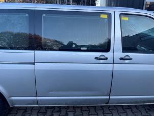 Używane Drzwi przesuwne prawe Volkswagen Transporter T5 1.9 TDi Cena € 250,00 Procedura marży oferowane przez Poolman autodemontage