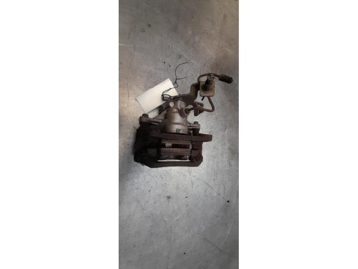 Rear brake calliper, left from a Opel Movano (4A1; 4A2; 4B2; 4B3; 4C2; 4C3) 2.5 CDTI 16V DPF 2008