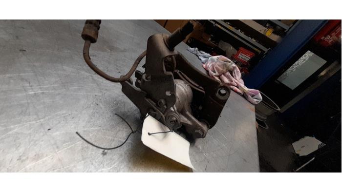 Rear brake calliper, left from a Opel Movano (4A1; 4A2; 4B2; 4B3; 4C2; 4C3) 2.5 CDTI 16V DPF 2008