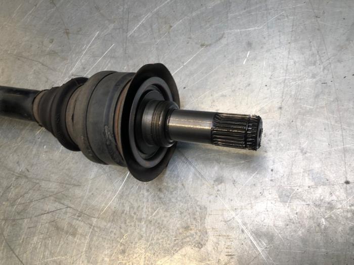 Drive shaft, rear left from a BMW 5 serie (F10) 535i 24V TwinPower Turbo 2012