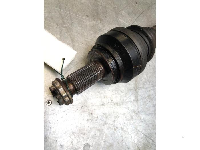 Drive shaft, rear left from a BMW 5 serie (F10) 535i 24V TwinPower Turbo 2012