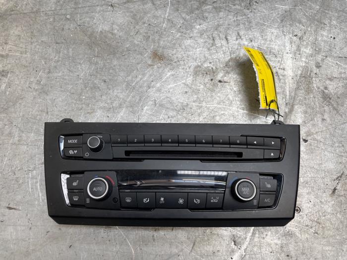 Używane Panel climatronic BMW 1 serie (F20) 118d 2.0 16V Cena € 99,00 Procedura marży oferowane przez Poolman autodemontage