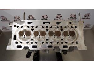 Used Cylinder head Ford Fiesta 5 (JD/JH) 1.4 TDCi Price € 125,00 Margin scheme offered by Autorecycling Reuvers B.V.