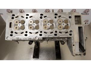 Used Cylinder head Opel Omega B Caravan (21/22/23) 2.2 DTI 16V Price € 150,00 Margin scheme offered by Autorecycling Reuvers B.V.