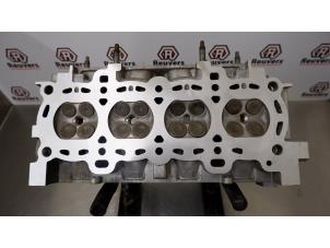 Used Cylinder head Ford Fiesta 4 1.25 16V Price € 150,00 Margin scheme offered by Autorecycling Reuvers B.V.