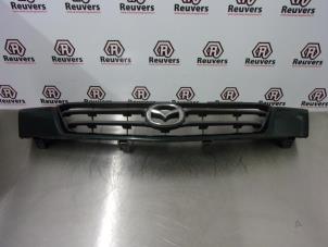 Used Grille Mazda Demio (DW) 1.5 16V Price € 30,00 Margin scheme offered by Autorecycling Reuvers B.V.
