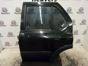 Used Rear door 4-door, left Opel Frontera (6B) 3.2 V6 24V Price on request offered by Autorecycling Reuvers B.V.