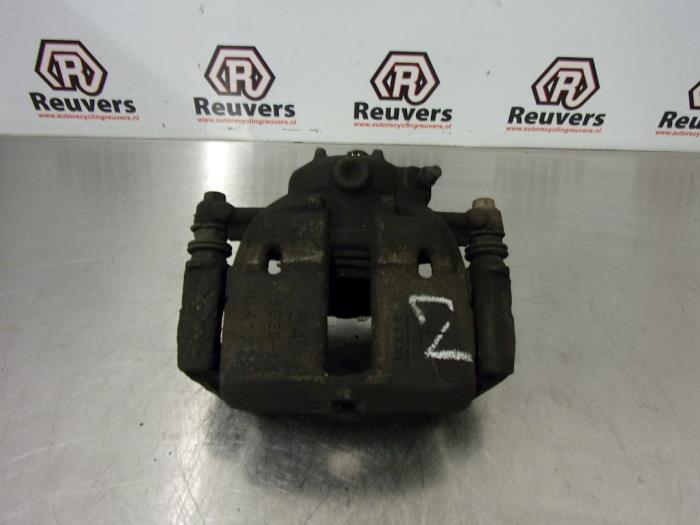 Front brake calliper, left from a Mitsubishi Colt (Z2/Z3) 1.3 16V 2006