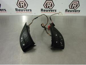 Used Steering wheel mounted radio control Fiat Grande Punto (199) 1.4 T-Jet 16V Price € 25,00 Margin scheme offered by Autorecycling Reuvers B.V.