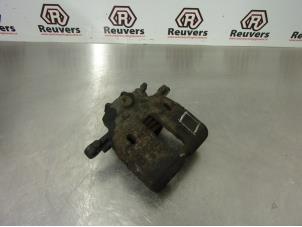Used Front brake calliper, left Mitsubishi Colt (Z2/Z3) 1.5 16V Price € 30,00 Margin scheme offered by Autorecycling Reuvers B.V.
