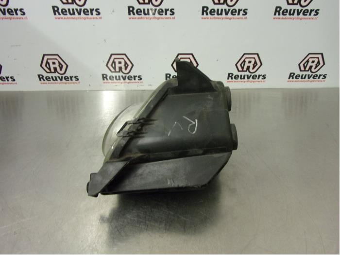 Fog light, front right from a Opel Corsa D 1.2 16V 2007