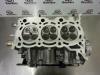 Cylinder head from a Smart Forfour (454) 1.1 12V 2005