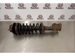 Used Front shock absorber rod, left Mazda Demio (DW) 1.3 16V Price € 35,00 Margin scheme offered by Autorecycling Reuvers B.V.
