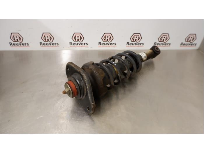 Rear shock absorber rod, left from a MINI Mini One/Cooper (R50) 1.6 16V Cooper 2003