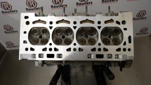 Used Cylinder head Peugeot 207/207+ (WA/WC/WM) 1.6 16V Price € 225,00 Margin scheme offered by Autorecycling Reuvers B.V.