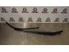 Front wiper arm from a Renault Clio III (BR/CR), 2005 / 2014 1.5 dCi 85, Hatchback, Diesel, 1.461cc, 63kW (86pk), FWD, K9K766; K9KT7, 2005-06 / 2012-12, BR1F; CR1F; BRCF; CRCF 2007