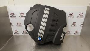Używane Pokrywa silnika BMW 1 serie (E81) 118d 16V Cena € 25,00 Procedura marży oferowane przez Autorecycling Reuvers B.V.