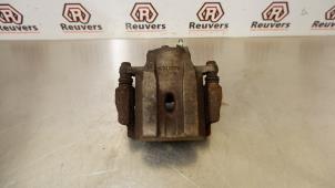Used Front brake calliper, left Toyota Prius (NHW20) 1.5 16V Price € 35,00 Margin scheme offered by Autorecycling Reuvers B.V.