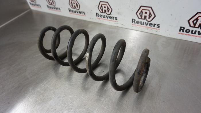 Rear coil spring from a Peugeot 307 CC (3B) 2.0 16V 2004
