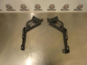 Used Bonnet Hinge Opel Corsa D 1.4 16V Twinport Price € 20,00 Margin scheme offered by Autorecycling Reuvers B.V.