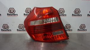 Used Taillight, left BMW 1 serie (E81) 116i 1.6 16V Price € 30,00 Margin scheme offered by Autorecycling Reuvers B.V.