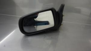 Used Wing mirror, left Mazda Demio (DW) 1.3 16V Price € 35,00 Margin scheme offered by Autorecycling Reuvers B.V.