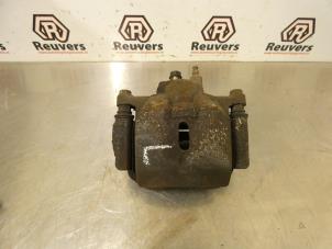 Used Front brake calliper, left Toyota Yaris Verso (P2) 1.5 16V Price € 30,00 Margin scheme offered by Autorecycling Reuvers B.V.