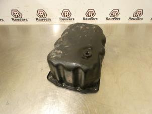 Couvercle carter d'un Peugeot 3008 I (0U/HU) 1.6 16V THP 155 2010