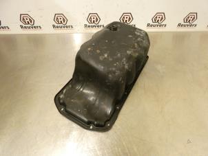 Couvercle carter d'un Peugeot 3008 I (0U/HU) 1.6 16V THP 155 2010