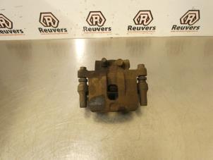 Used Rear brake calliper, left Dodge Caliber 1.8 16V Price € 40,00 Margin scheme offered by Autorecycling Reuvers B.V.