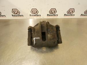 Used Front brake calliper, left Peugeot 1007 (KM) 1.4 Price € 25,00 Margin scheme offered by Autorecycling Reuvers B.V.