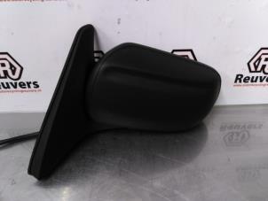 Used Wing mirror, left Mazda Demio (DW) 1.5 16V Price € 35,00 Margin scheme offered by Autorecycling Reuvers B.V.