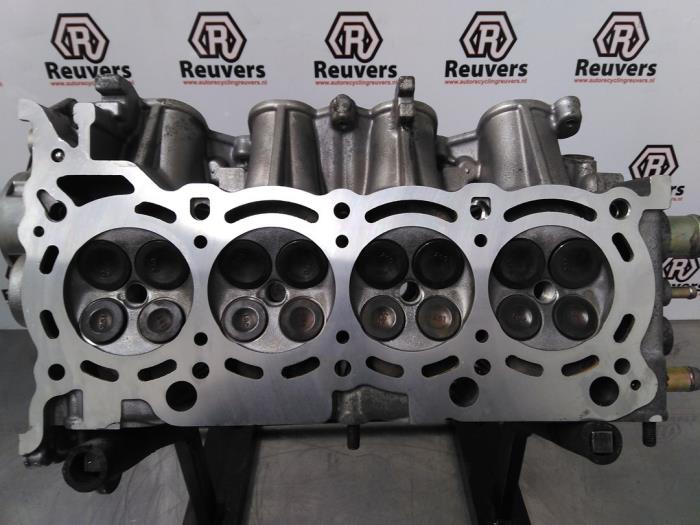 Cylinder head Mitsubishi Colt 1.3 16V MN155155H 135930