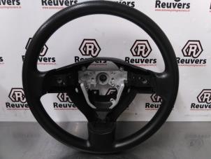 Used Steering wheel Daihatsu Cuore (L251/271/276) 1.0 12V DVVT Price € 45,00 Margin scheme offered by Autorecycling Reuvers B.V.