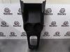 Middle console from a Daihatsu Cuore (L251/271/276) 1.0 12V DVVT 2012