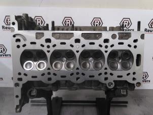 Used Cylinder head Opel Corsa C (F08/68) 1.2 16V Twin Port Price € 350,00 Margin scheme offered by Autorecycling Reuvers B.V.