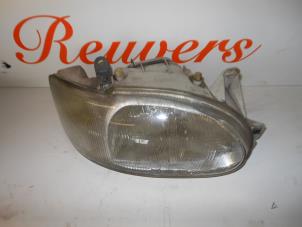 Used Headlight, right Ford Escort 6 (AAL/ABL) 1.6 16V Price € 35,00 Margin scheme offered by Autorecycling Reuvers B.V.