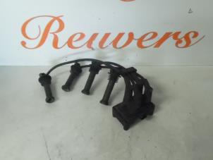 Used Ignition coil Ford Fiesta 5 (JD/JH) 1.4 16V Price € 25,00 Margin scheme offered by Autorecycling Reuvers B.V.