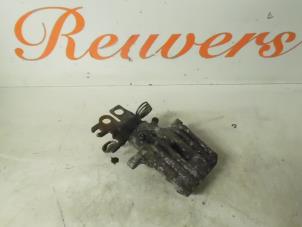 Used Rear brake calliper, left Volkswagen Caddy III (2KA,2KH,2CA,2CH) 1.9 TDI Price € 35,00 Margin scheme offered by Autorecycling Reuvers B.V.