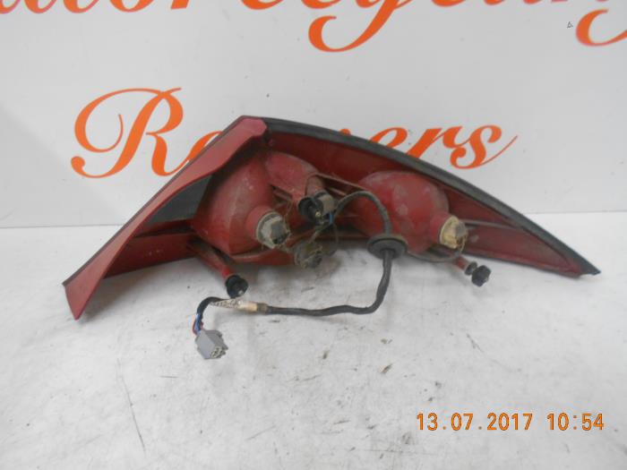 Taillight, left from a Ford Cougar (ECX/W) 2.5 24V 2000