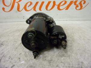 Starter from a Volkswagen Passat (3B2) 1.8 20V 2000