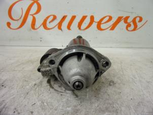 Starter from a Volkswagen Passat (3B2) 1.8 20V 2000