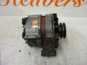 Dynamo från en Saab 900 I 2.0 i 16V 1993