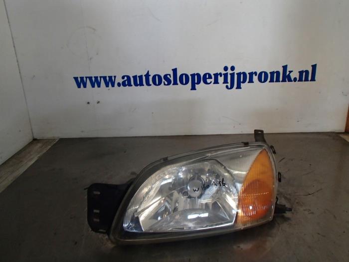 Używane Reflektor lewy Ford Courier Cena € 25,00 Procedura marży oferowane przez Autosloopbedrijf Jan Pronk B.V.