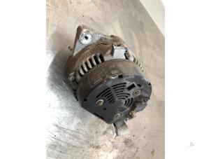 Dynamo van een Opel Vectra B (36) 1.8 16V Ecotec 1999